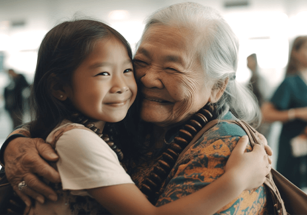 Grand kid embracing his grandma after getting family visa